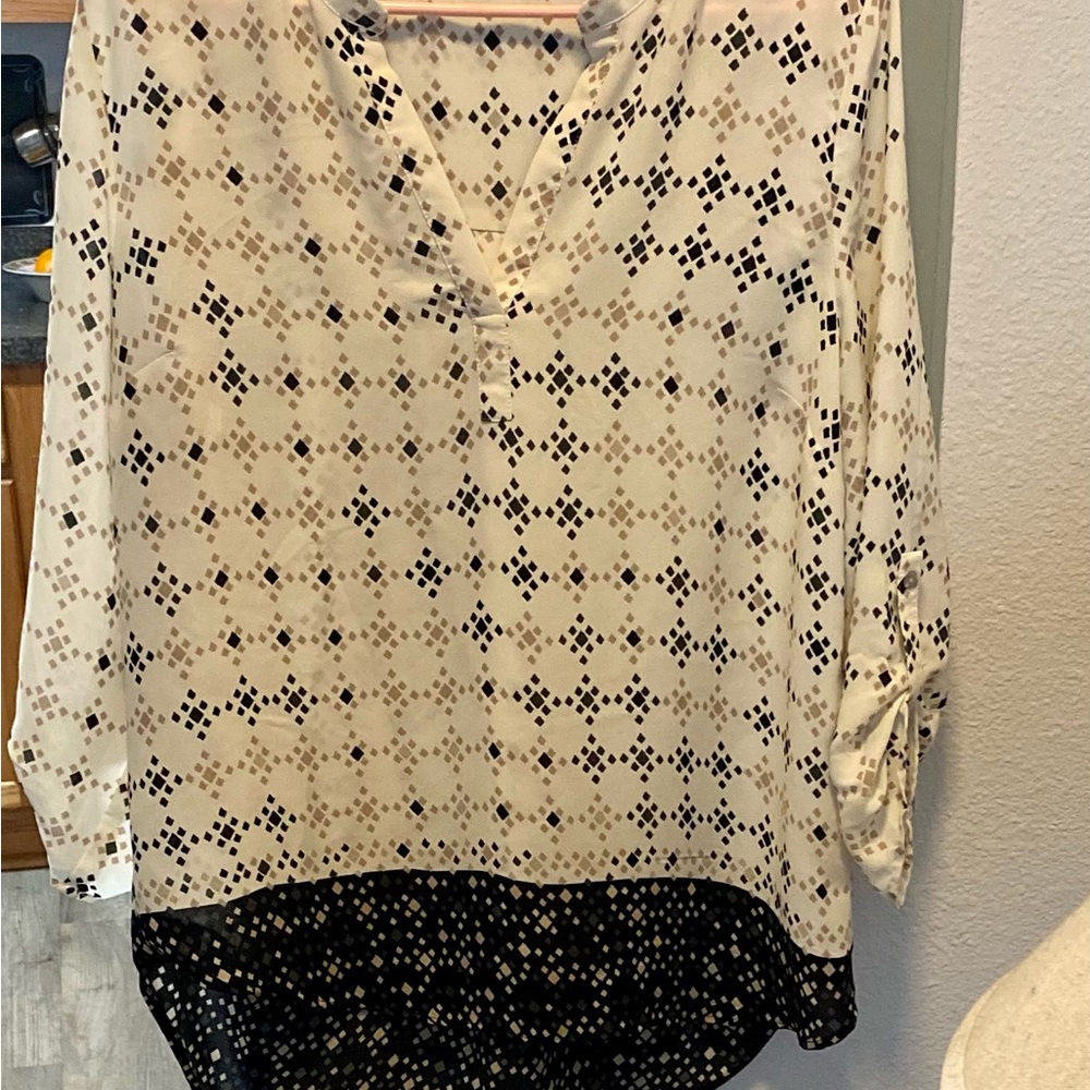 Woman’s “ black rain “ blouse
